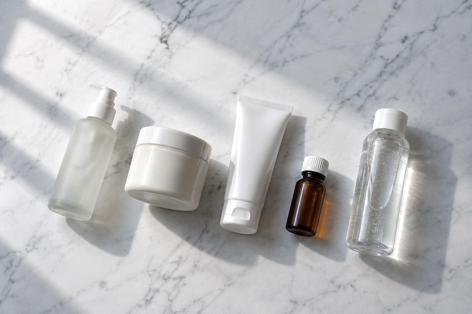Ordered skincare products for acne prescription routine including cleanser, moisturizer, sunscreen, and tretinoin tube.