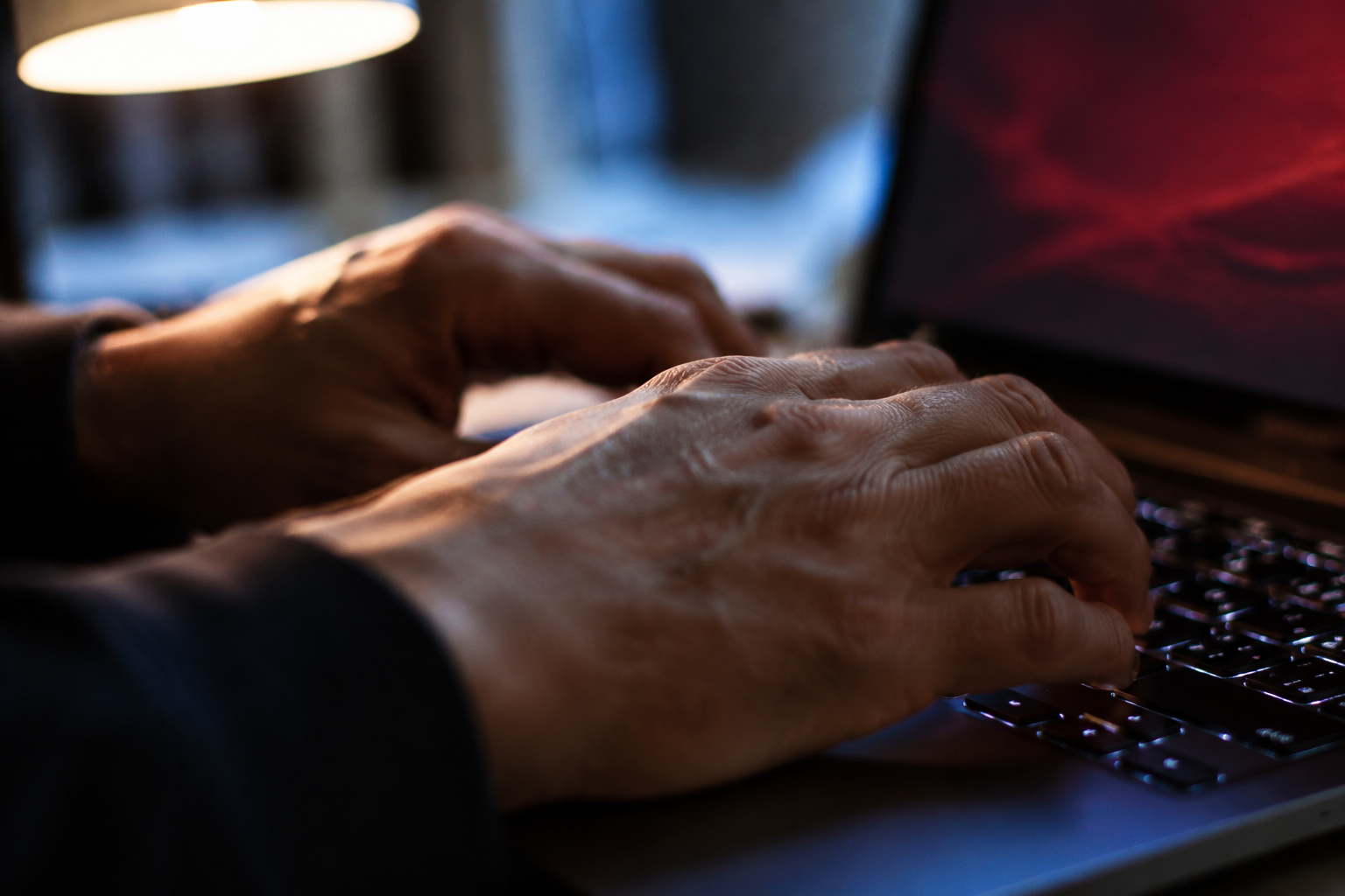 Person troubleshooting an iPLEDGE login error on a laptop with a red browser error message visible